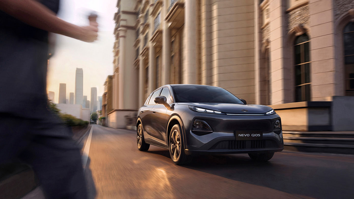 Grey 2026 Changan NEVO Q05 electric SUV driving in a city